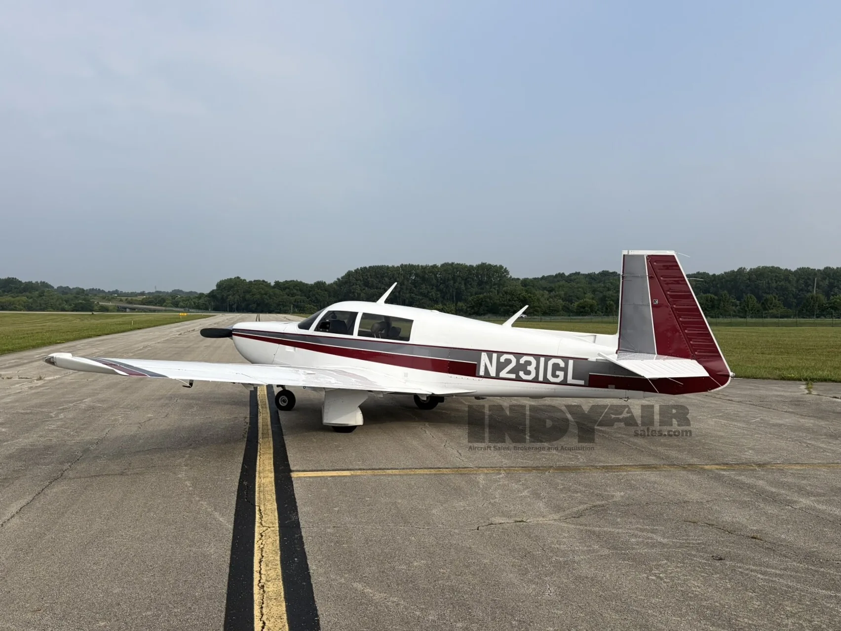 Exterior view of a Mooney M20K, N231GL.