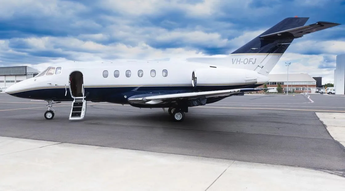 Exterior view of a 2003 HAWKER 800XP, VH-OFJ.