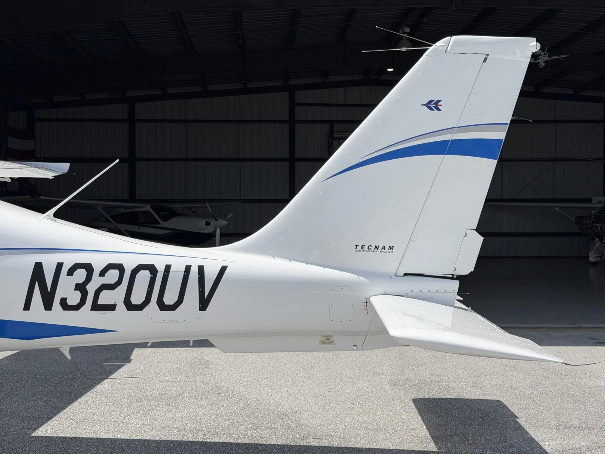 Exterior view of a 2025 TECNAM P2010 MKII, N320UV.