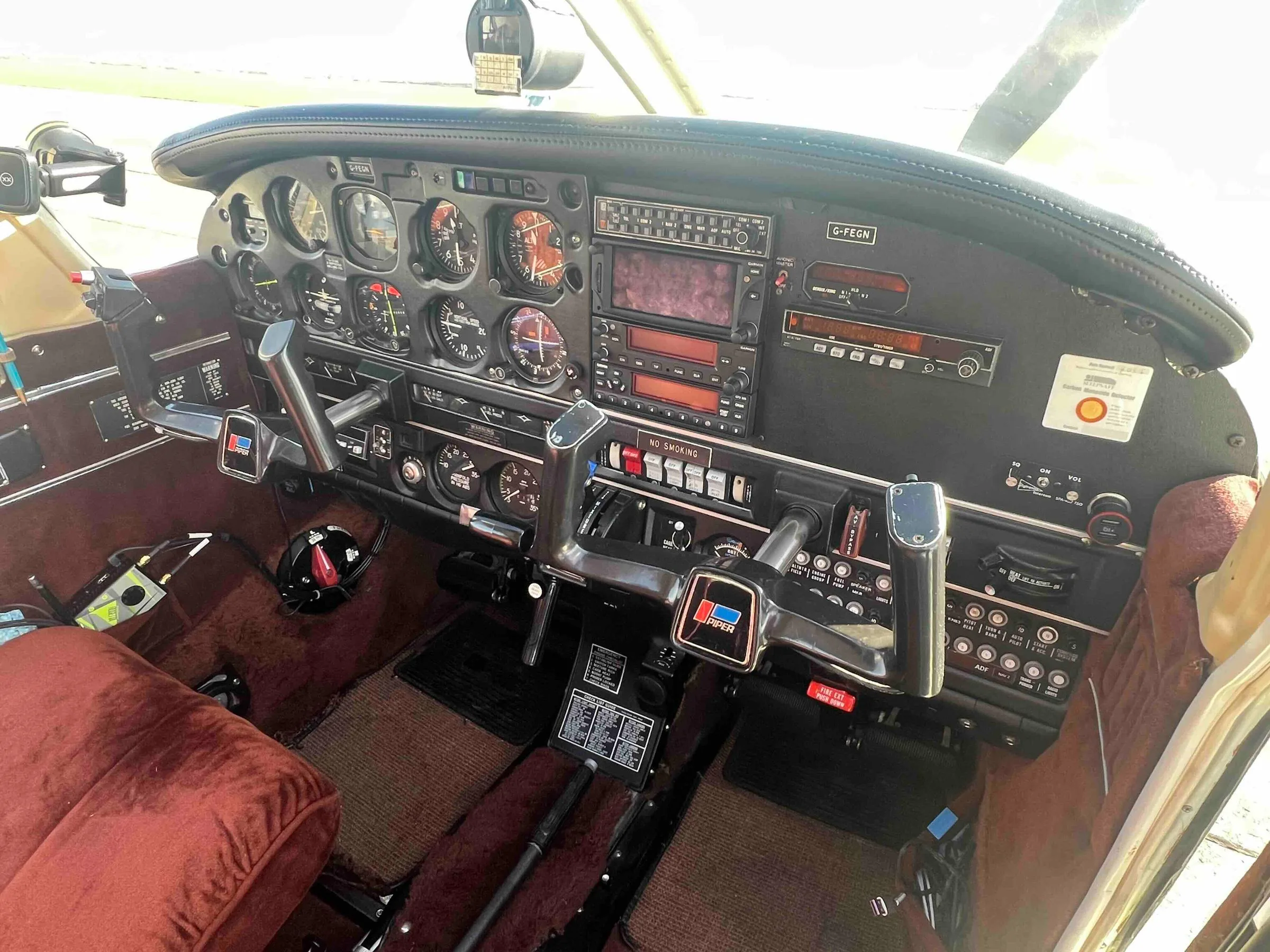Cockpit and instrument panel of a 1984 Piper PA-28-236 Dakota.
