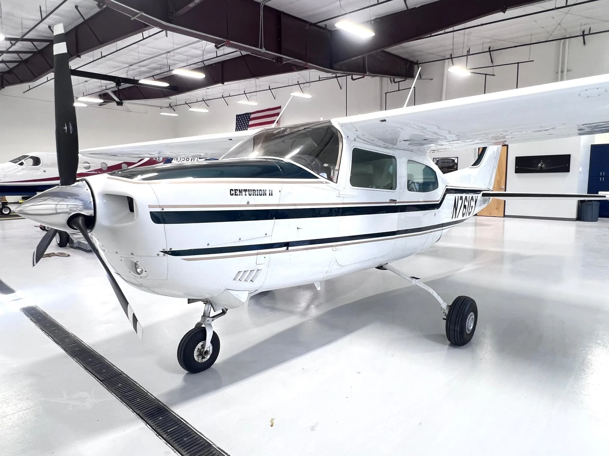 Exterior view of a 1977 CESSNA TURBO 210M, N761GY.