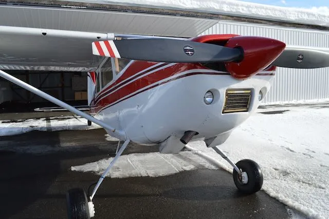 Exterior view of a 1963 Cessna 180F, N25722.