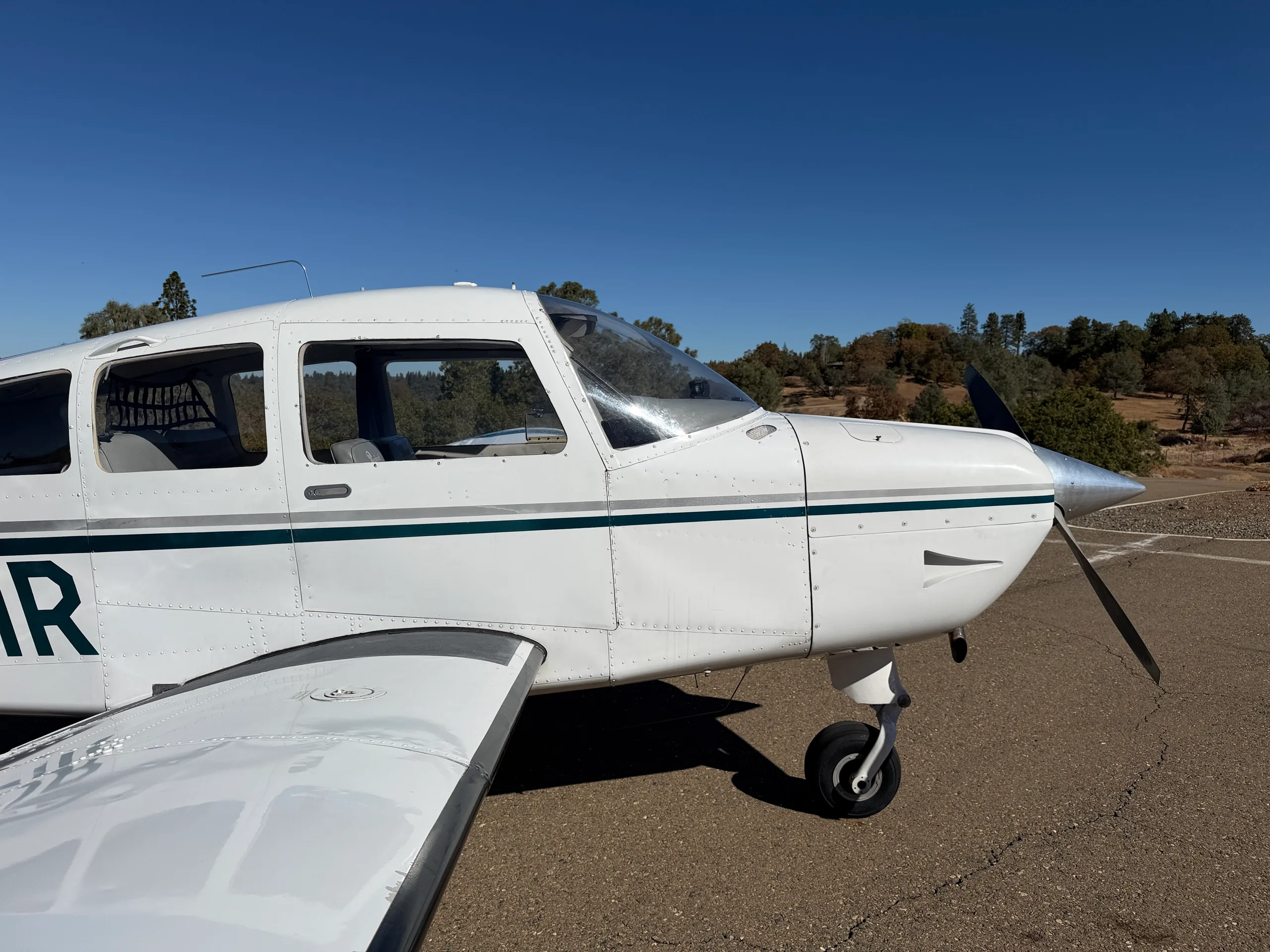 Exterior view of a 1974 Beechcraft Sundowner C23 $69,000 - (Here at Placerville), N6621R.