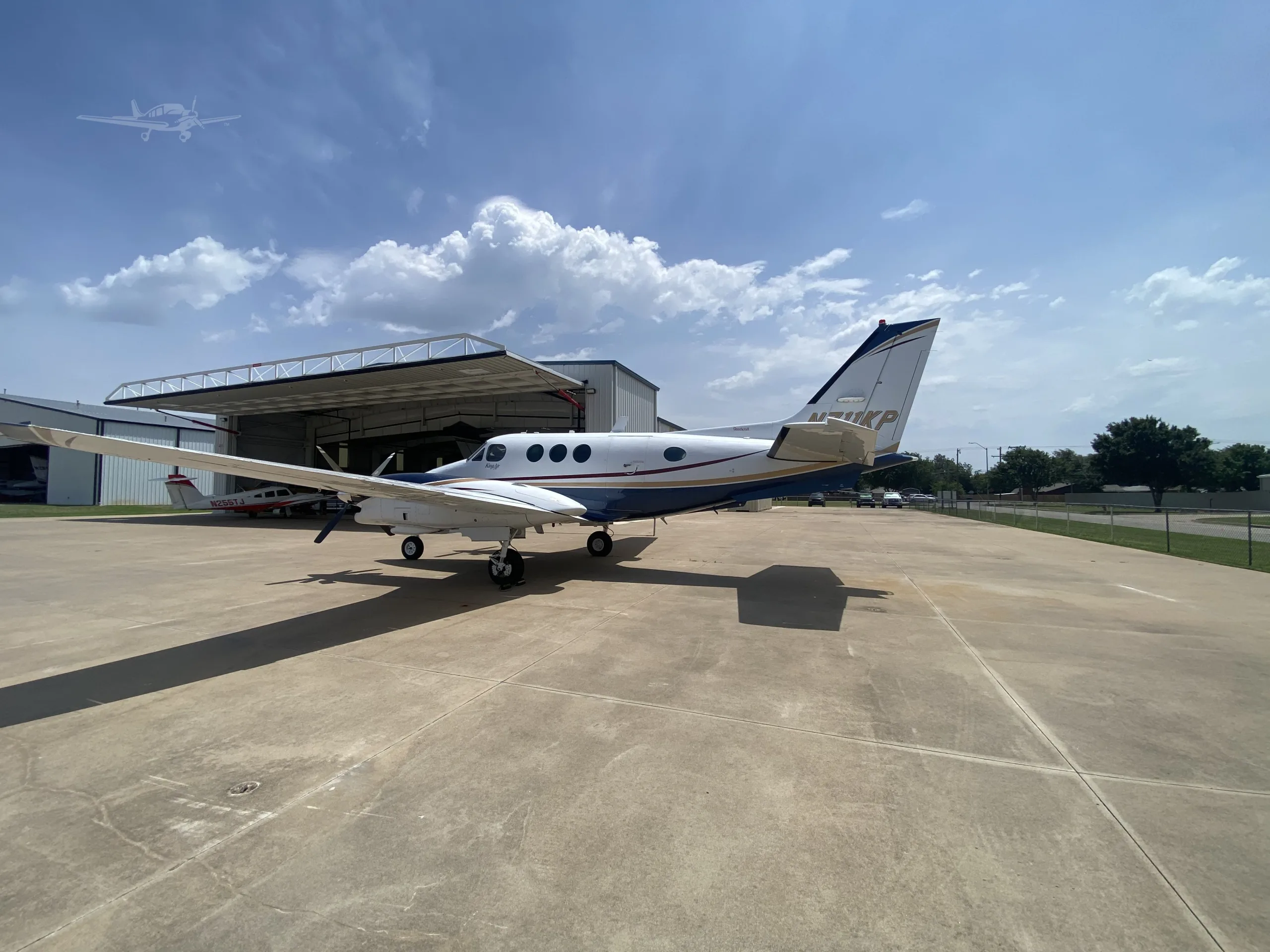 Exterior view of a 1976 BEECHCRAFT KING AIR C90, N711KP.