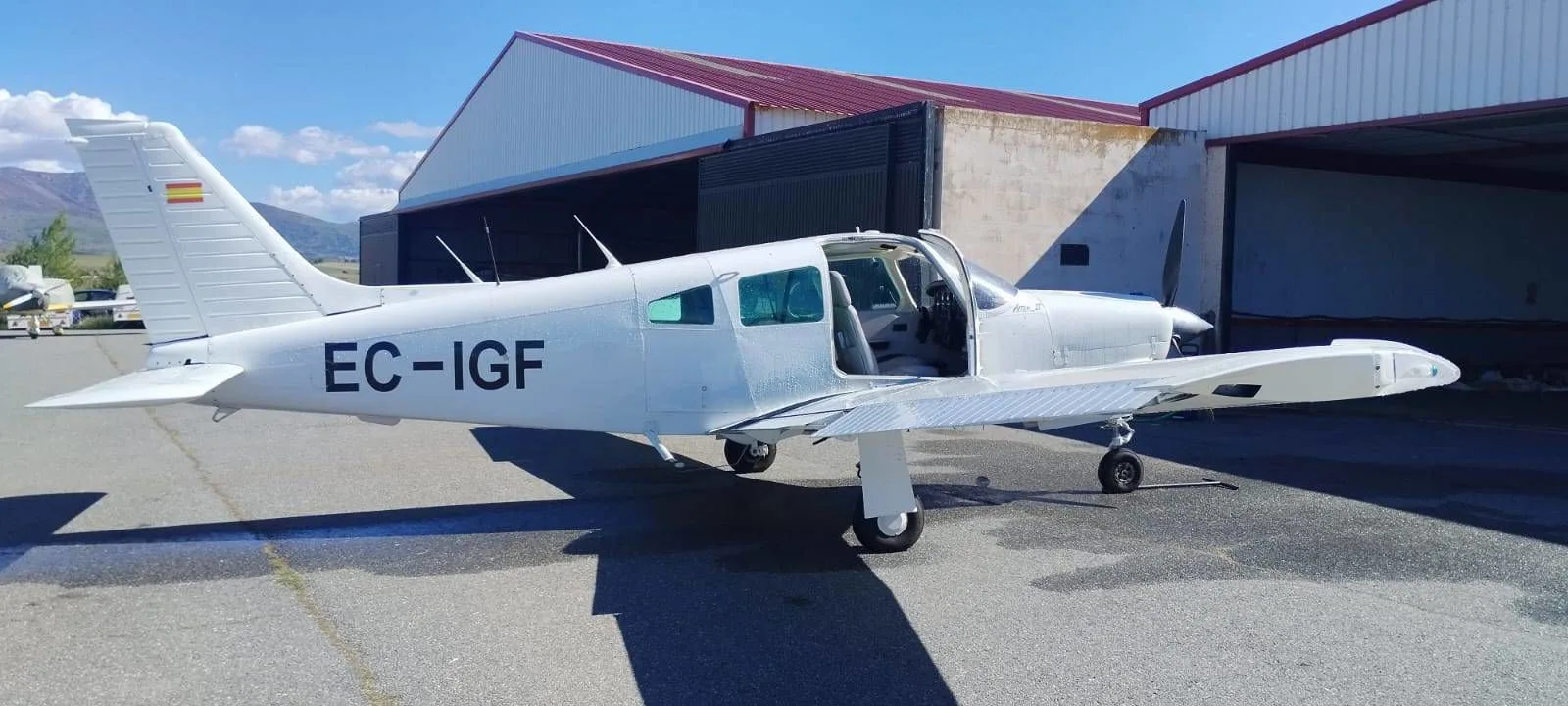 Exterior view of a 1977 Piper PA-28R-201 Arrow III.