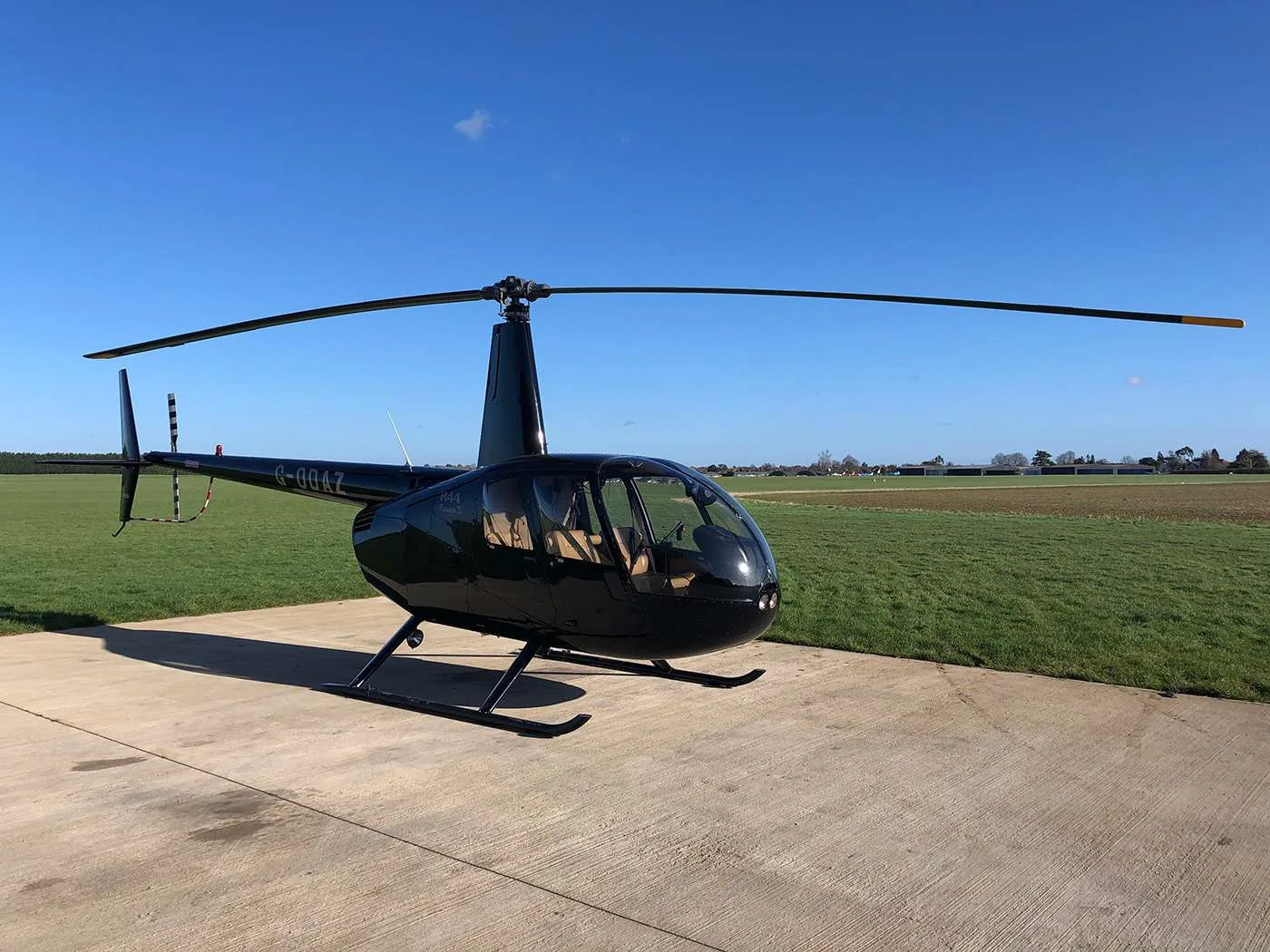 Exterior view of a 2008 Robinson R44 Raven II.