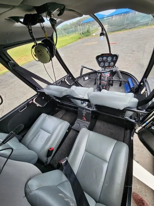Cockpit and instrument panel of a 2001 ROBINSON R44 RAVEN I.