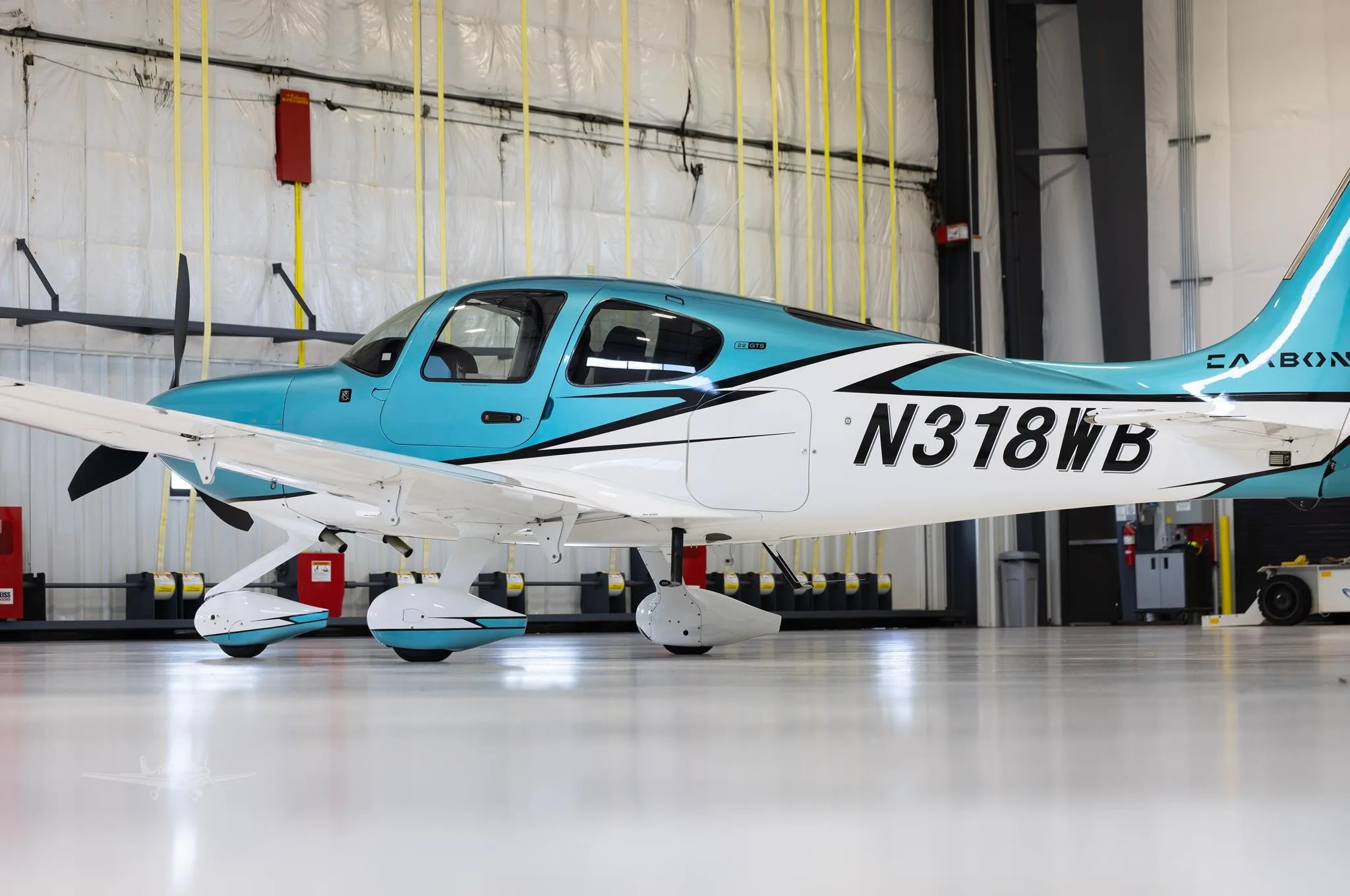 Exterior view of a 2023 CIRRUS SR22-G6, N318WB.