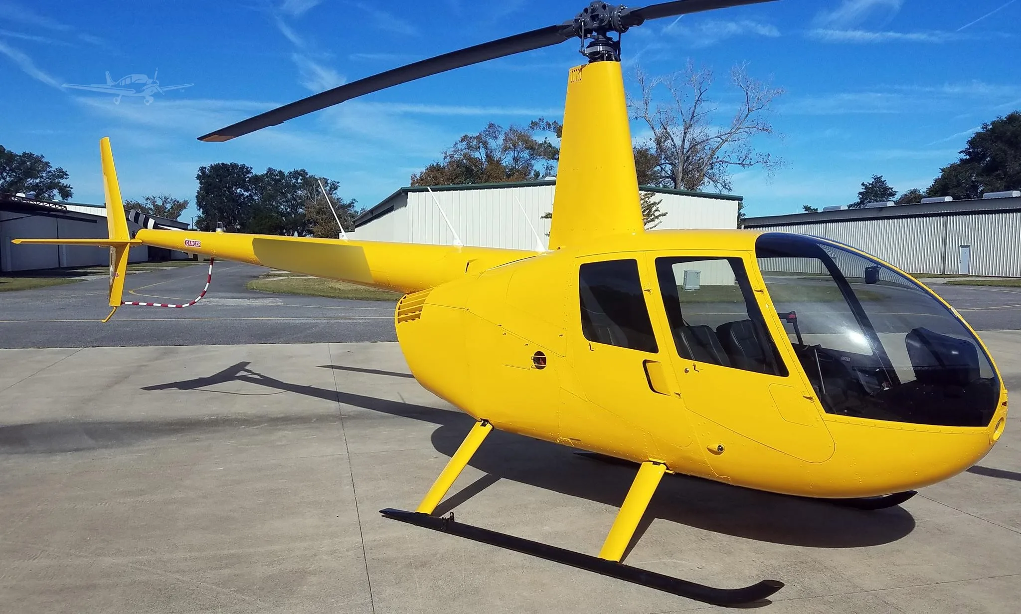 Exterior view of a 2002 ROBINSON R44 RAVEN I.