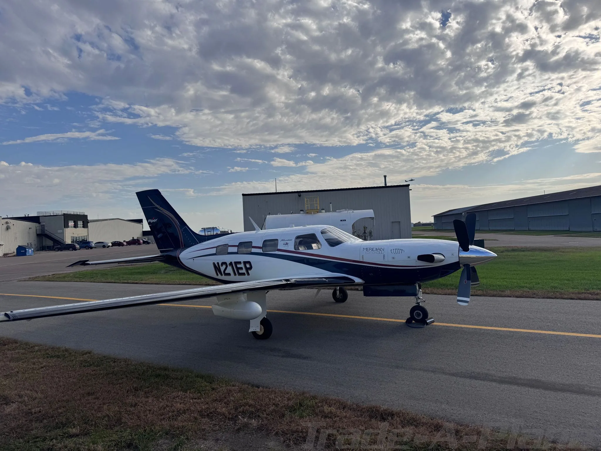 Exterior view of a 2013 PIPER MALIBU MERIDIAN, N21EP.
