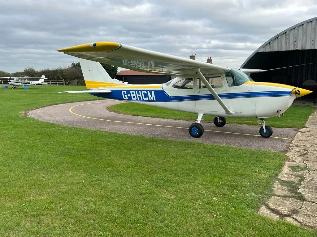 Exterior view of a Cessna Piston 180, N9206C.