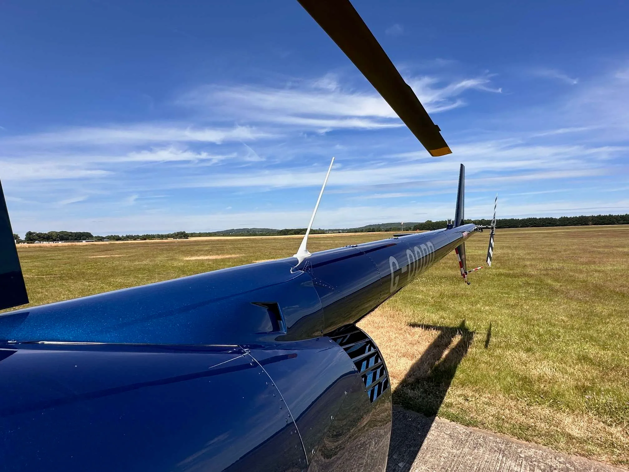 Exterior view of a 2015 Robinson R44 Raven II.
