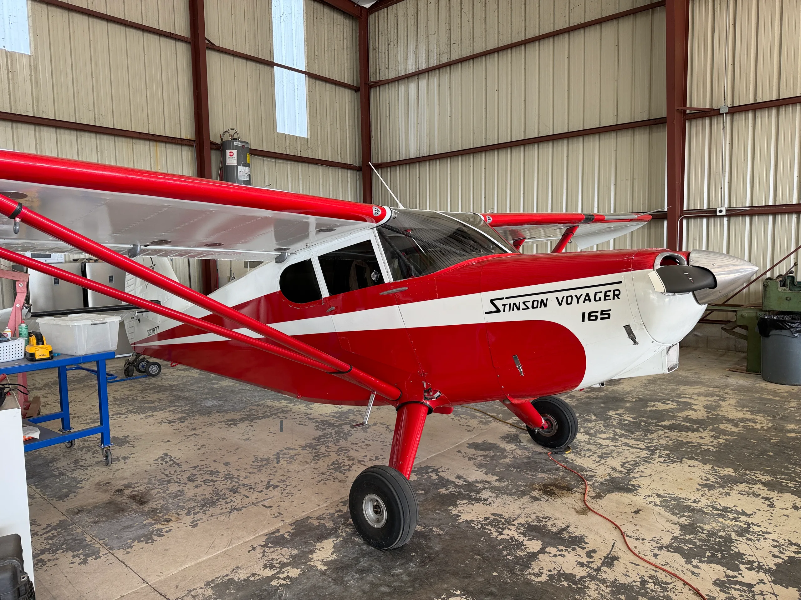 Exterior view of a 1946 Stinson 108-1 Voyager, N97877.