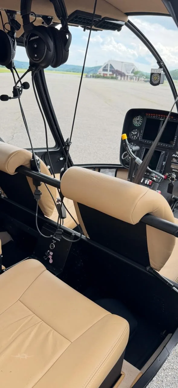 Cockpit and instrument panel of a 2017 ROBINSON R44 RAVEN II.