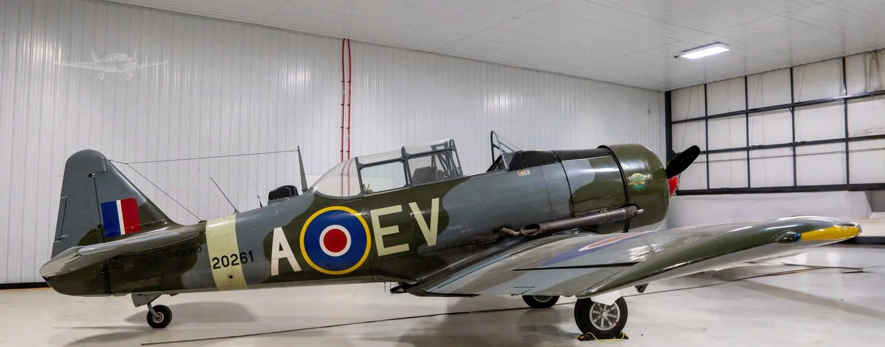 Exterior view of a 1951 HARVARD MKIV, C-FWWO.