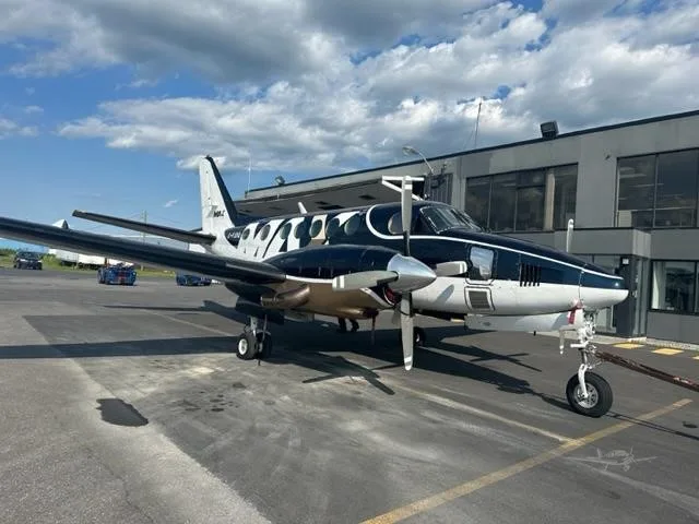 Exterior view of a 1976 BEECHCRAFT KING AIR B100, C-FJDQ.