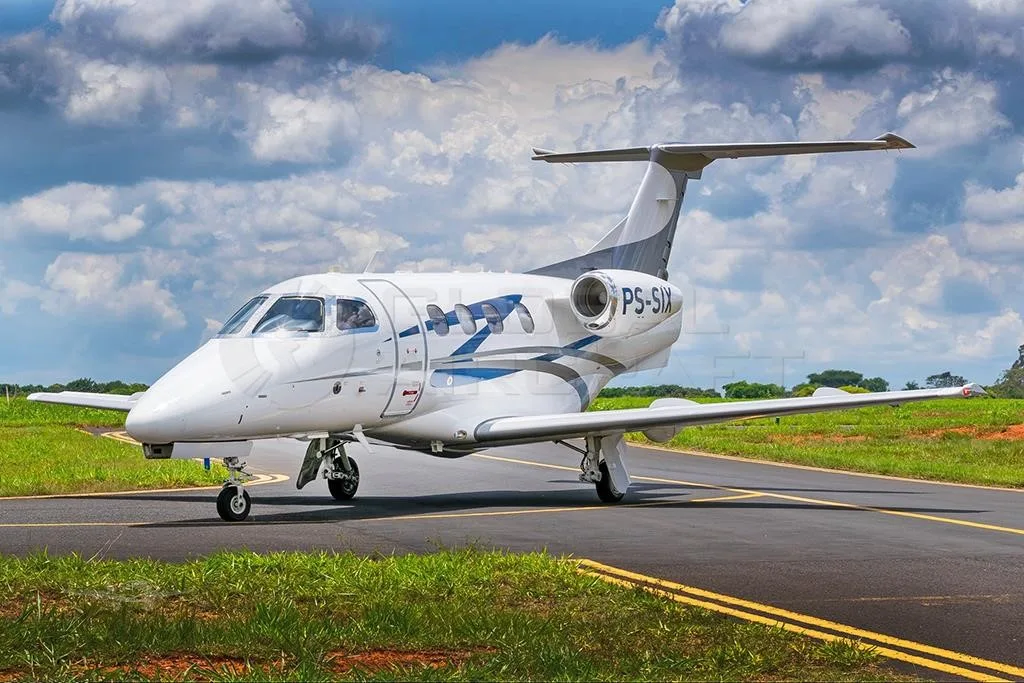 Exterior view of a 2016 EMBRAER PHENOM 100E, PS-SIX.