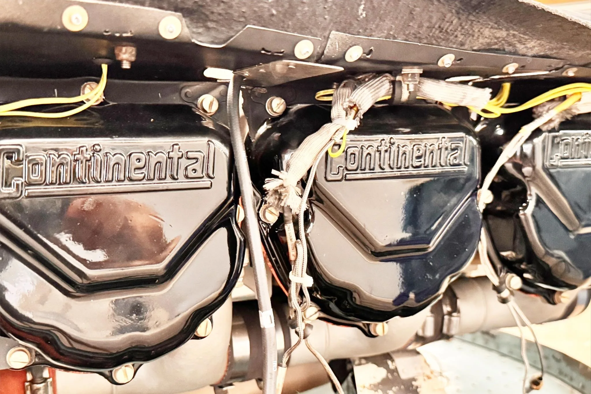 Engine detail of a 1964 CESSNA U206 SUPER SKYWAGON.