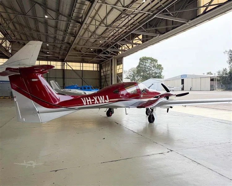 Exterior view of a 2022 DIAMOND DA62, VH-XWJ.