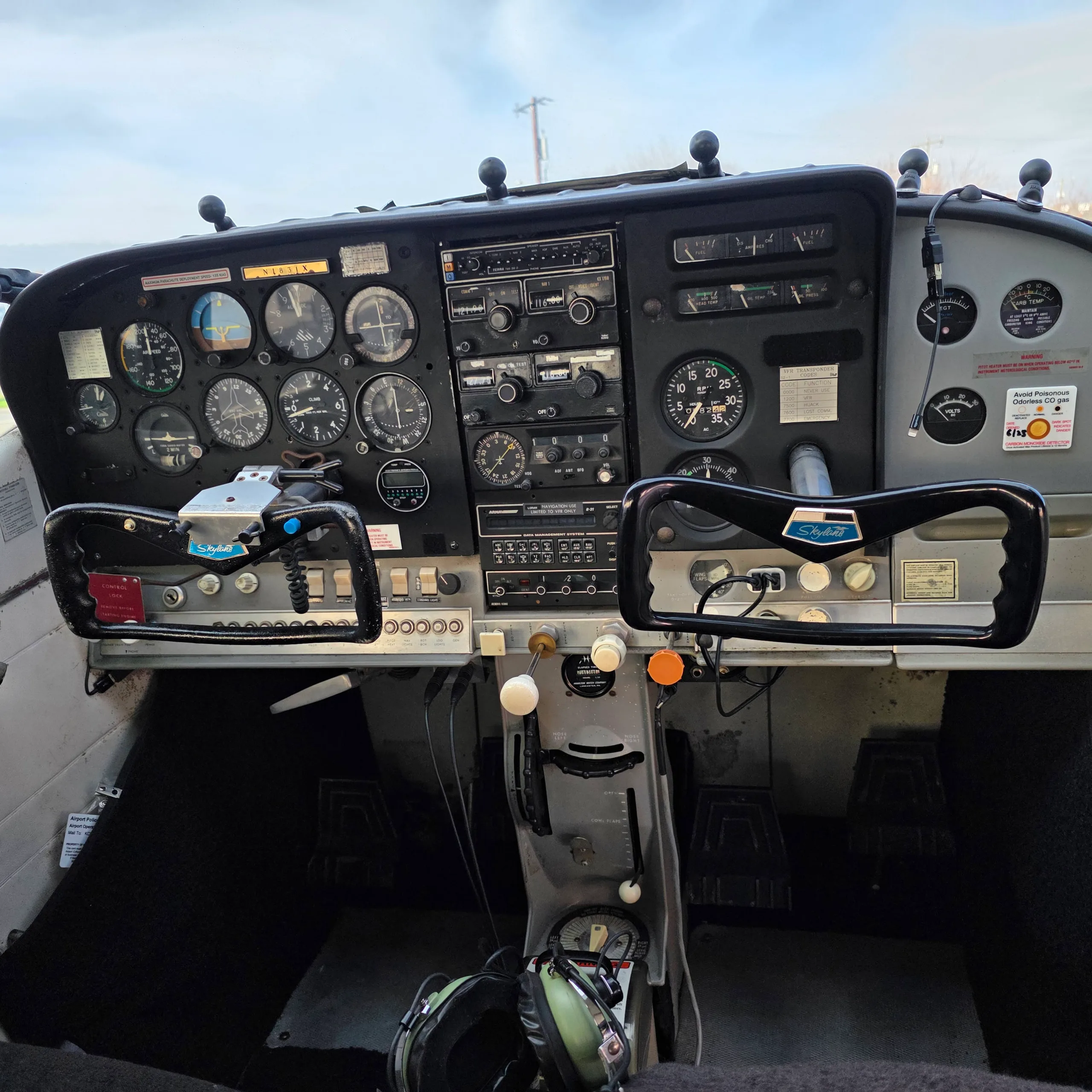 Cockpit and instrument panel of a 1968 Piper 182H.