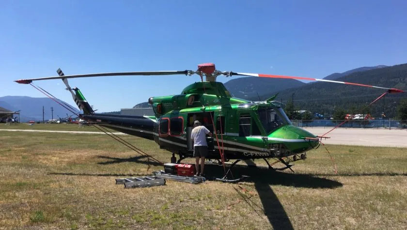 Exterior view of a 1983 Bell 412 33103, C-FXWB.