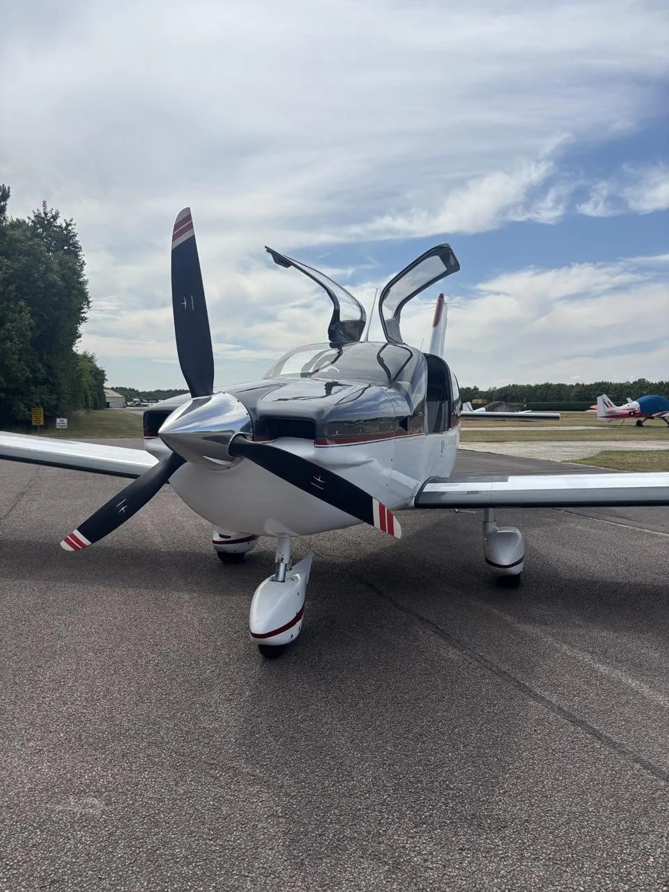 Exterior view of a 1980 SOCATA TB-10 TOBAGO, G-IGGL.