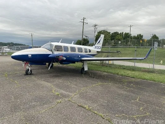 Marketing image of a 1974 Piper Navajo Chieftain PA-31-350.