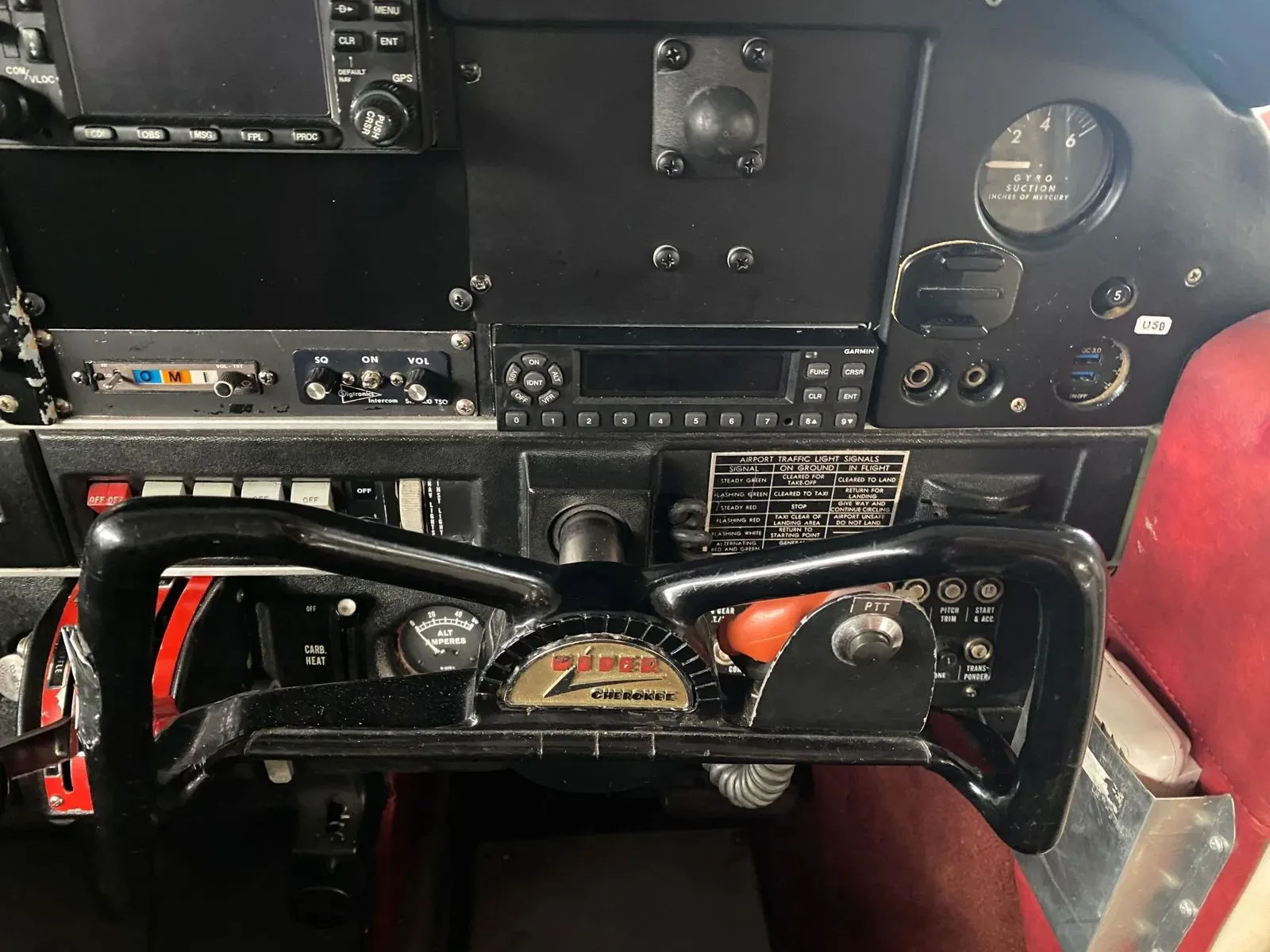 Cockpit and instrument panel of a 1973 Piper PA-28-140 Cherokee.
