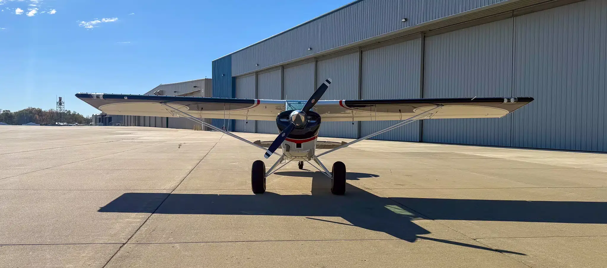 Exterior view of a 2010 Aviat A-1C Husky, N409BW.