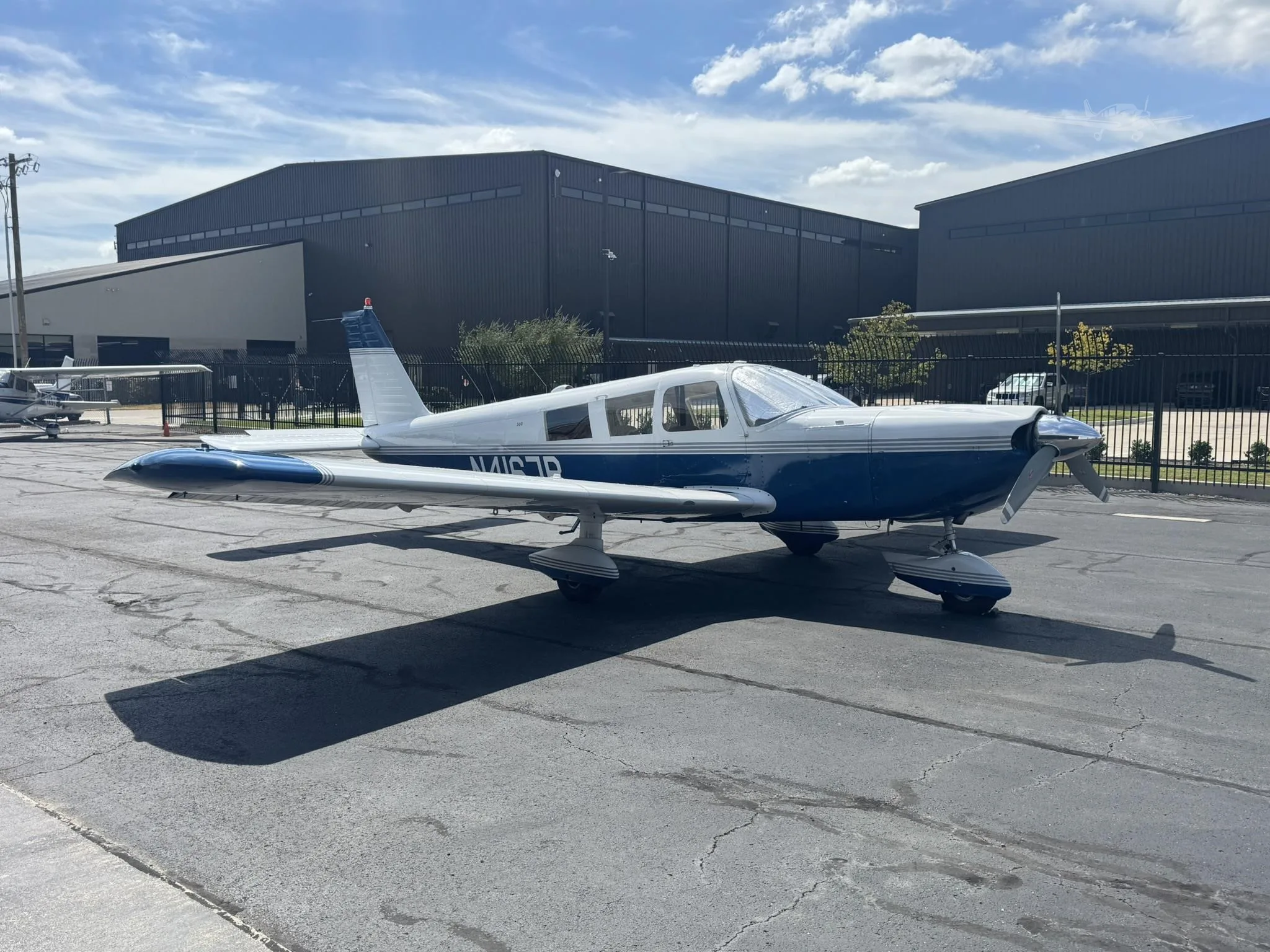 Exterior view of a 1968 PIPER CHEROKEE 6/300, N4167R.