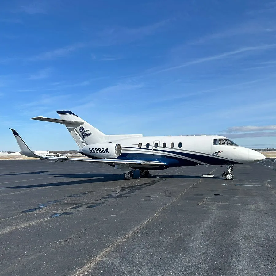 Exterior view of a 1997 Dassault 900EX, N79LE.