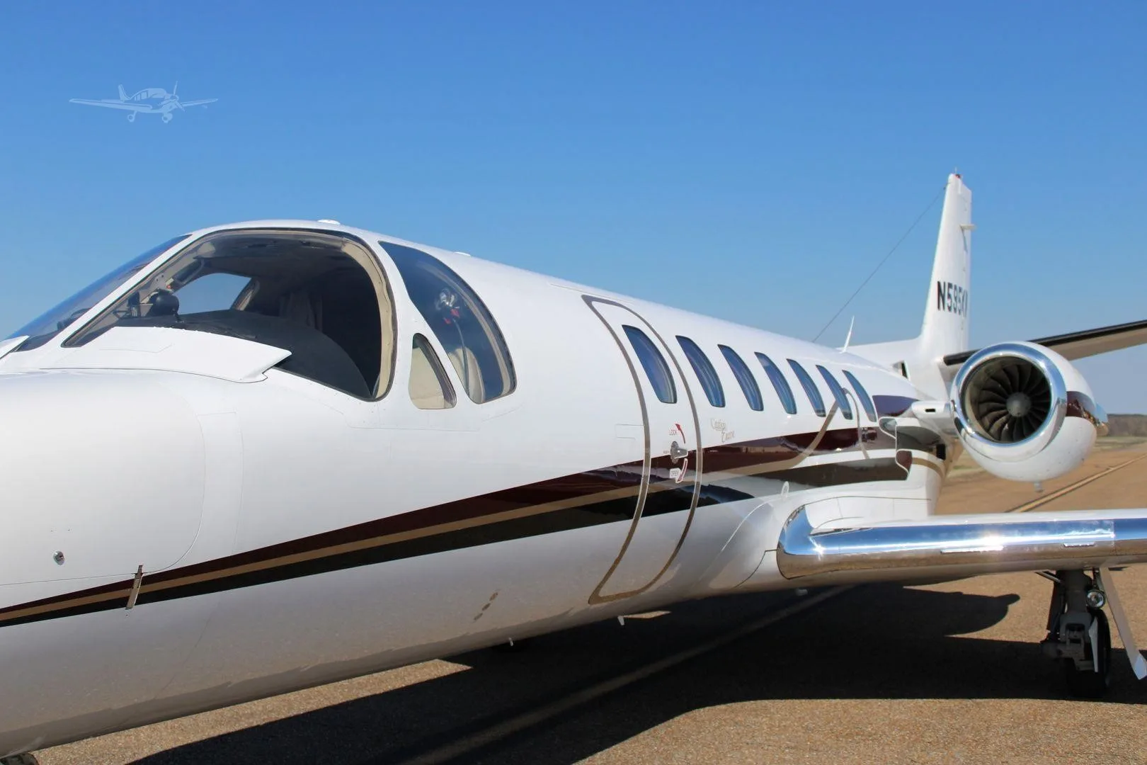 Exterior view of a 2002 CESSNA CITATION ENCORE, N595KW.
