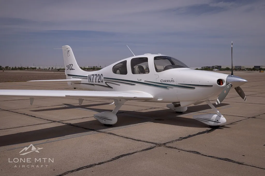 Exterior view of a 2002 Cirrus SR22, N772C.