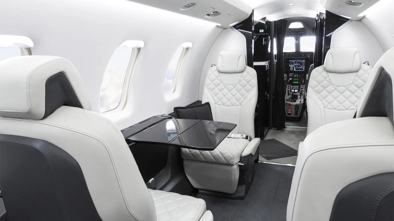 Cabin interior of a Pilatus Jet.