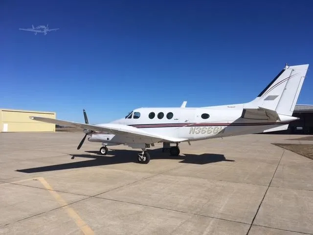 Exterior view of a 1979 BEECHCRAFT KING AIR E90, N366GW.