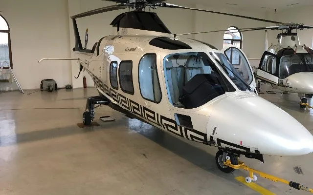Exterior view of a 2010 Agusta A109 Grand, YR-TIM.