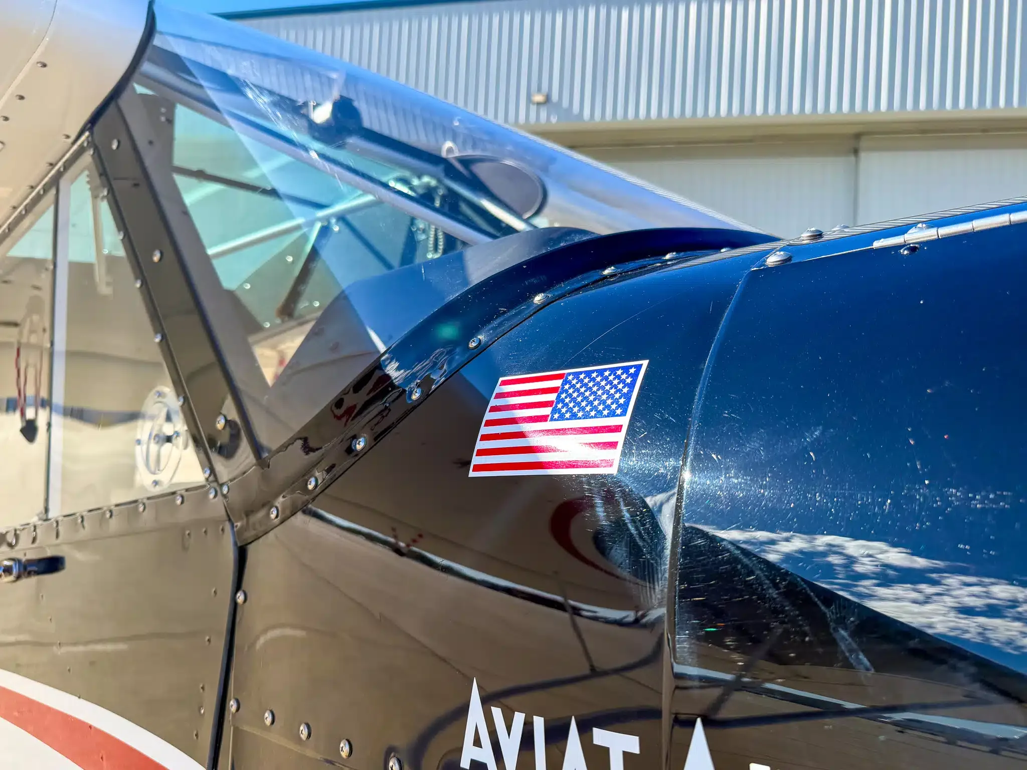 Exterior view of a 2010 Aviat A-1C Husky, N409BW.