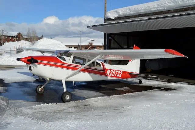 Exterior view of a 1963 Cessna 180F, N25722.